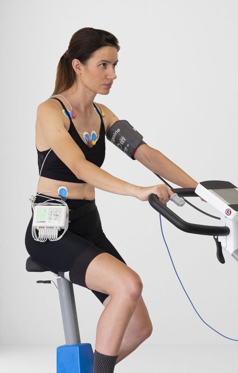 Woman on the bike with ECG