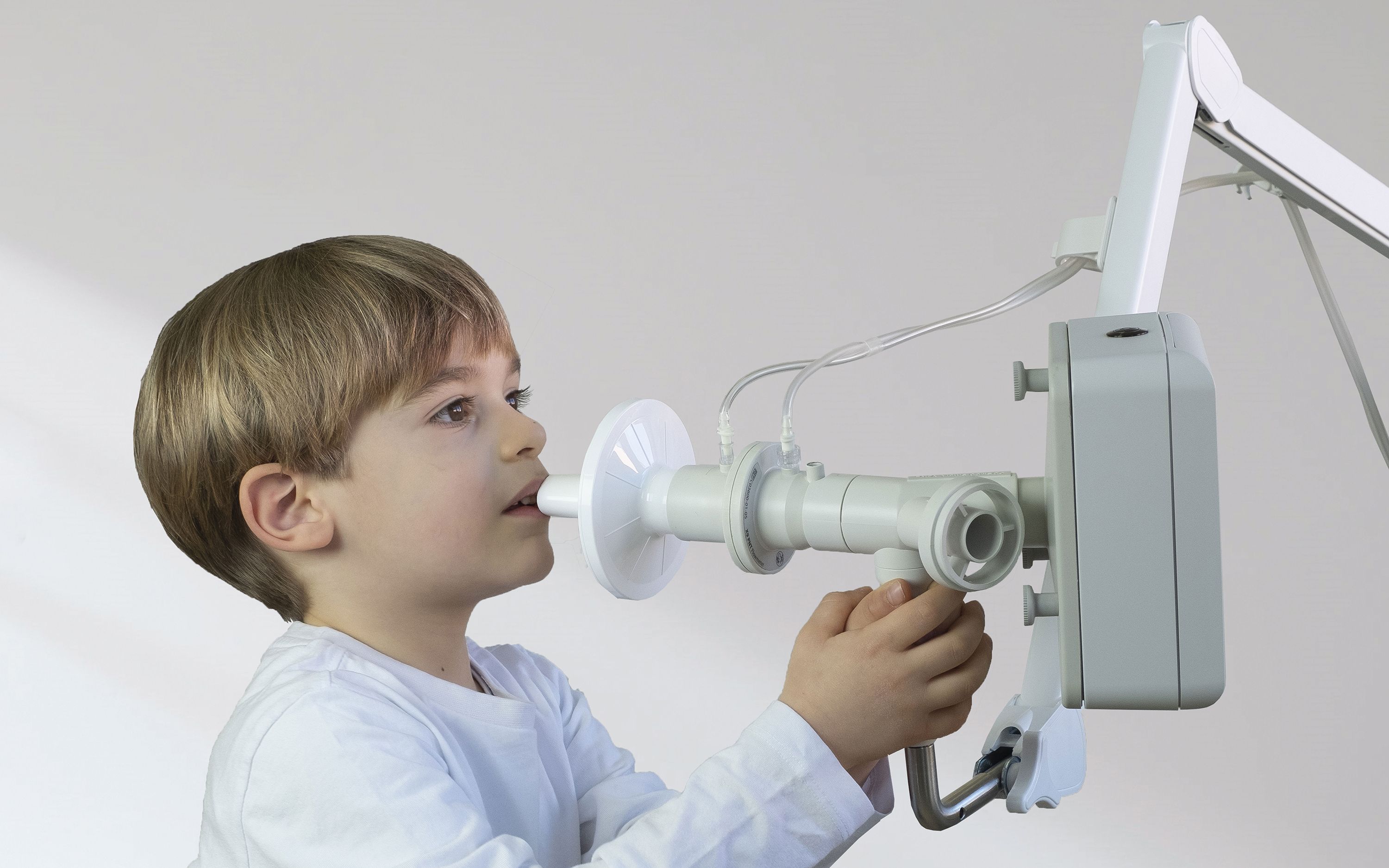 Boy using Q-i2m FOT module 