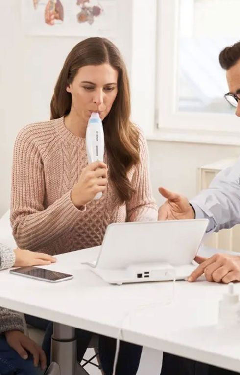 Woman doing the test with Vivatmo Pro